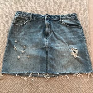 Semi distressed denim mini skirt